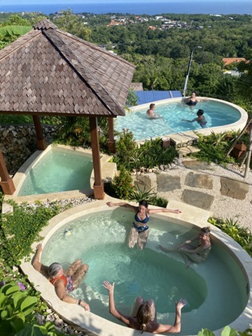 Tiered hot and cold plunge pools with ocean view