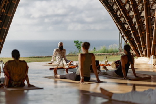 A meditation in a bamboo dome above the ocean