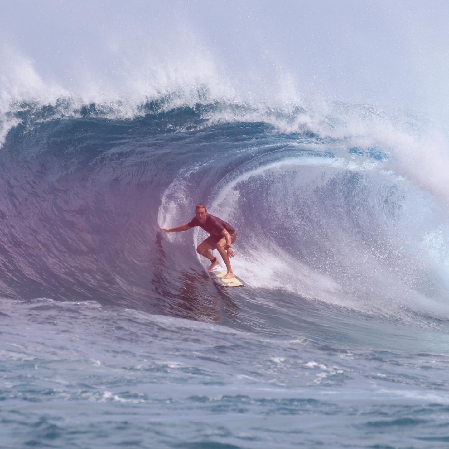 Surfer inside a perfect barrel in the Mentawai Islands